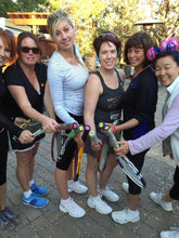 Load image into Gallery viewer, A group of women with our funny Tennis Butt decals on the ends of their tennis racquets