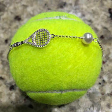 Load image into Gallery viewer, Luxe Tennis Racket and Pearl bracelet with a tennis ball