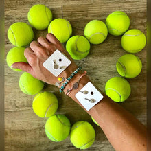 Load image into Gallery viewer, Hit Happy tennis jewelry options with bracelets and earrings
