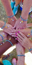 Load image into Gallery viewer, A group of women wearing the Tennis Karma Bracelet
