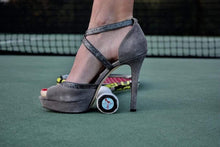 Load image into Gallery viewer, Our funny Tennis Butt Decals - "Flip Flops or Heels" on the end of a tennis racquet with a woman wearing heels