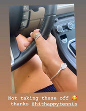Load image into Gallery viewer, Woman wearing the Luxe Tennis Racket and Pearl bracelet while driving