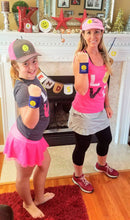 Load image into Gallery viewer, A woman and a girl wearing Hit Happy Tennis Wristbands and Hit Happy shirts and hats