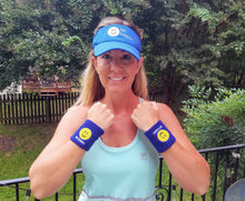 Load image into Gallery viewer, Woman wearing 2 Hit Happy Tennis Wristbands