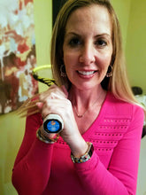 Load image into Gallery viewer, A woman holding a tennis racquet with our funny Tennis Butt Decal - "Sunshine or Snowflake" on the end