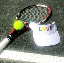 Load image into Gallery viewer, White "LOVE Tennis" Mesh Visor with tennis racquet and ball on the tennis court