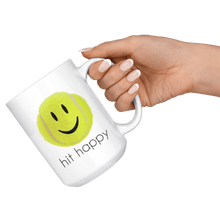 Load image into Gallery viewer, Hand holding the Hit Happy Tennis Coffee Mug
