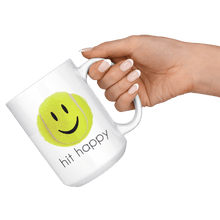 Load image into Gallery viewer, Hand holding the Hit Happy Tennis Coffee Mug