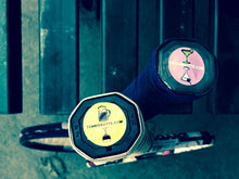 Load image into Gallery viewer, Two tennis racquets with our funny Tennis Butt Decals on the ends