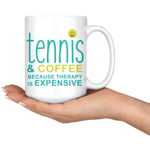Load image into Gallery viewer, Hand holding the &quot;Tennis &amp; coffee because therapy is expensive&quot; Coffee Mug
