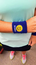 Load image into Gallery viewer, A woman wearing a Hit Happy Tennis Wristband
