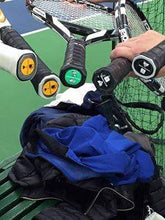 Load image into Gallery viewer, Our funny Tennis Butt Decals - &quot;Kitties or Puppies&quot; on tennis racquets on the tennis court
