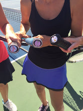 Load image into Gallery viewer, Our funny Tennis Butt Decals on three tennis racquets on the tennis court
