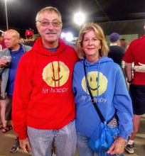 Load image into Gallery viewer, A man and woman wearing the Hit Happy Tennis Hoodie at a match
