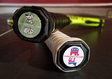 Load image into Gallery viewer, Two tennis racquets with our funny Tennis Butt Decals on the ends
