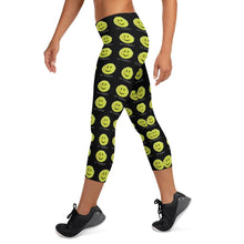 Load image into Gallery viewer, Left side view of the Hit Happy Tennis Capri Leggings
