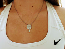 Load image into Gallery viewer, Woman wearing the Pickleball Paddle Pendant Necklace with a Nike top

